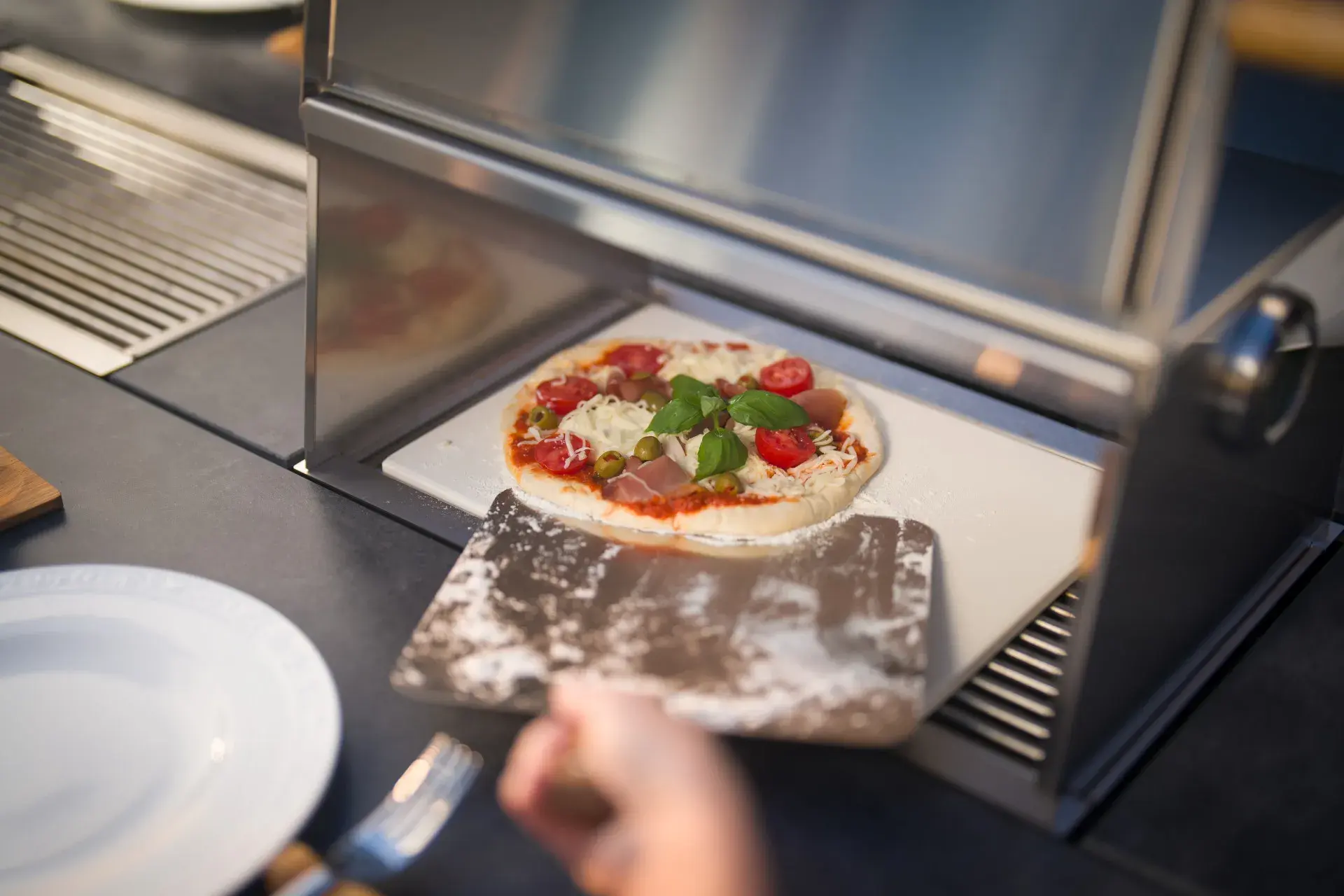 Sonderzubehör Pizzastein und Pizzahaube